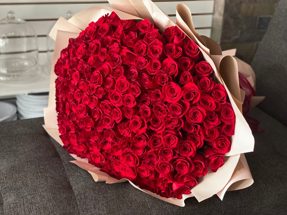 Romantic red roses bouquet with elegant wrapping